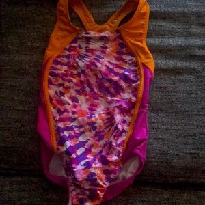 A speedo swimsuit in size 8 with Colorful patterns